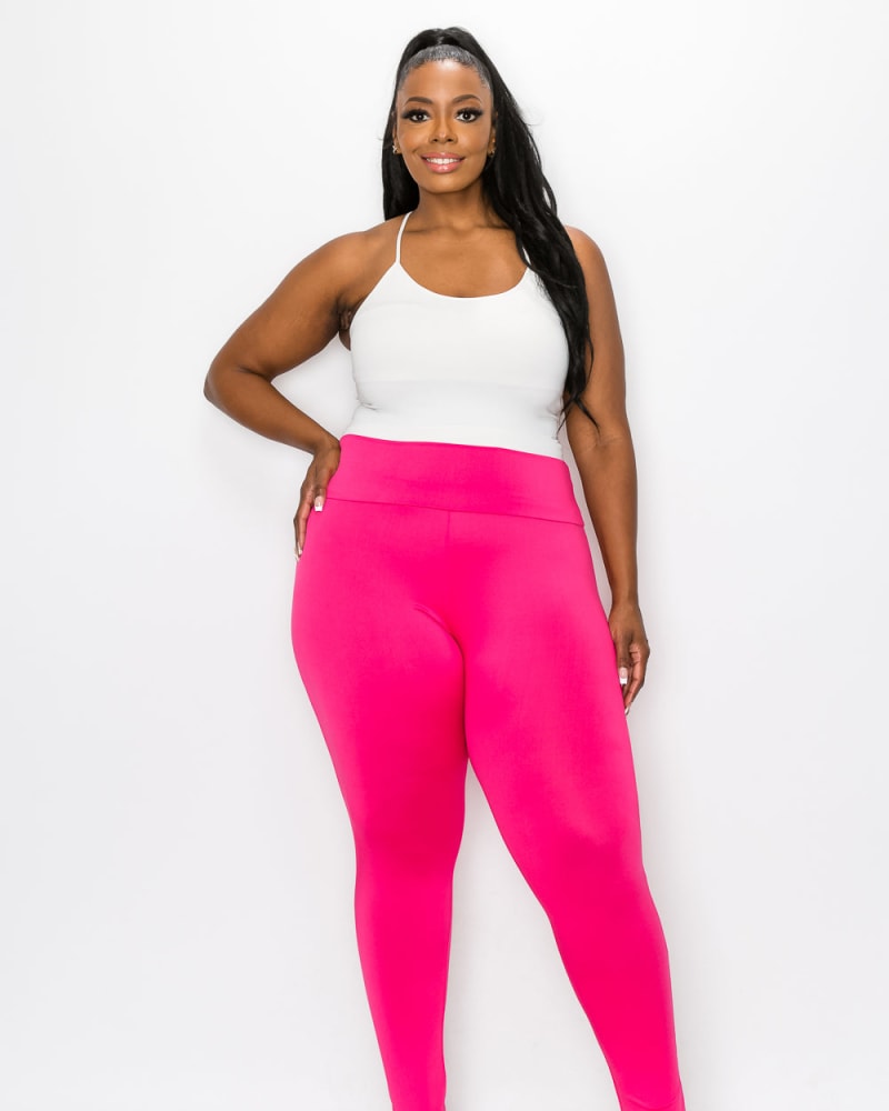 Front of a model wearing a size 1X Kelly Everyday Yoga Leggings in Fuchsia by L I V D. | dia_product_style_image_id:240965